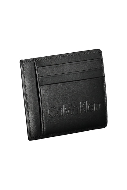 Black leather wallet with embossed brand logo and three card slots on the front.