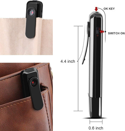 Black clip-on camera, 4.4 inches long, attached to paper and leather surfaces.
