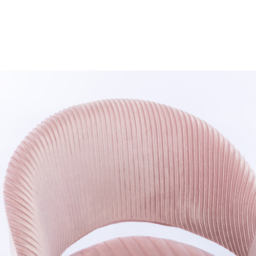 Close-up of a pink, ribbed, curved chair back against a white background.