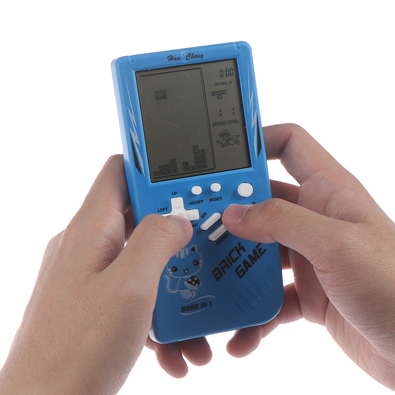 Hands holding a blue handheld game console with a Tetris-like game on screen.