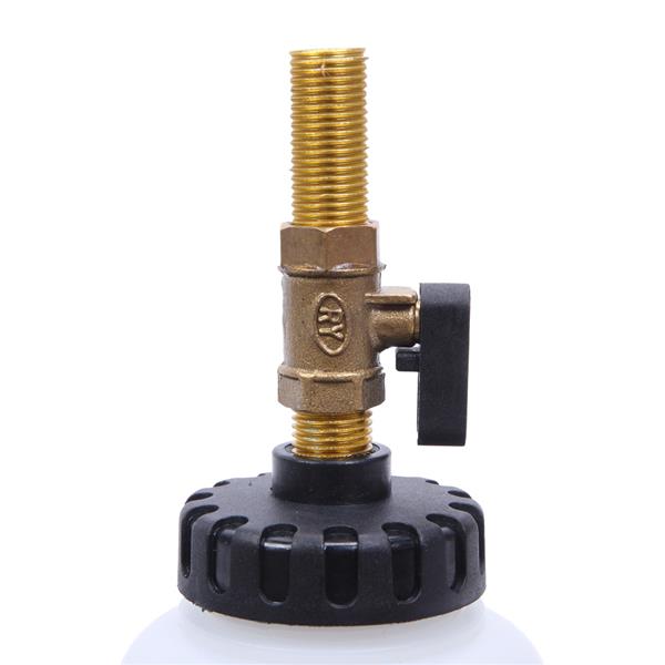 Brass threaded valve with black handle on top of a black and white cylindrical base.