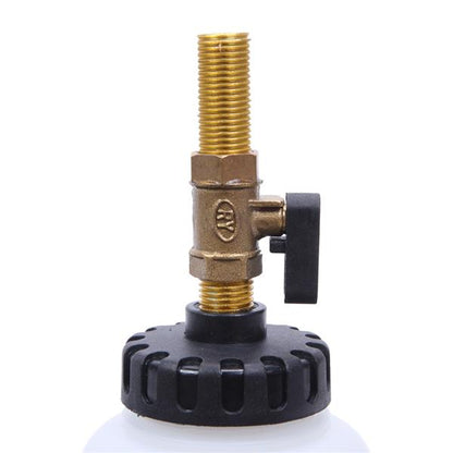 Brass threaded valve with black handle on top of a black and white cylindrical base.