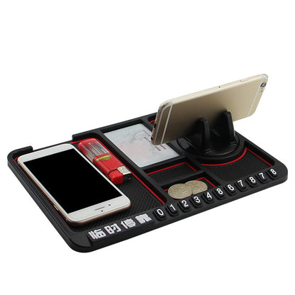 Black organizer with slots holding two phones, coins, and a red lighter, with number dial.