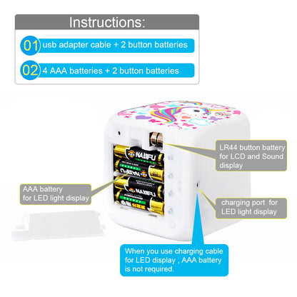 Cube with unicorn design, open battery compartment with AAA and LR44 batteries, charging port labels.