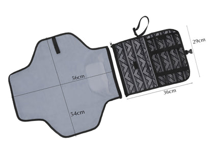 Open black travel organizer with chevron pattern, 56x54cm mat attached, and 36x29cm pockets.