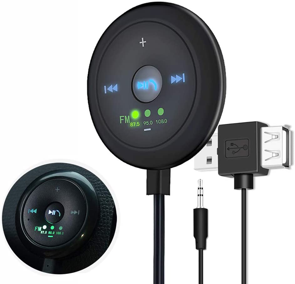 Black circular FM transmitter device with blue and green LED lights, USB, and aux connectors attached.