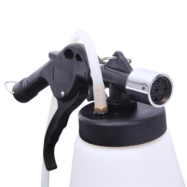 Black and white spray bottle with a metallic nozzle and a rubber hose connection.