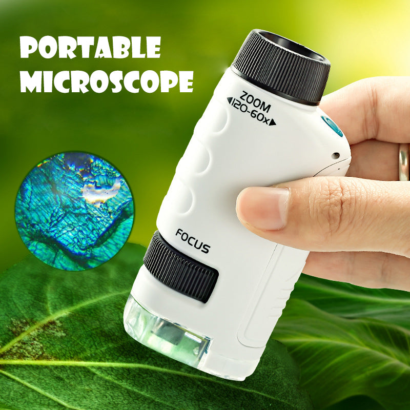 Hand holding a white portable microscope over a green leaf with a zoomed-in circular inset.