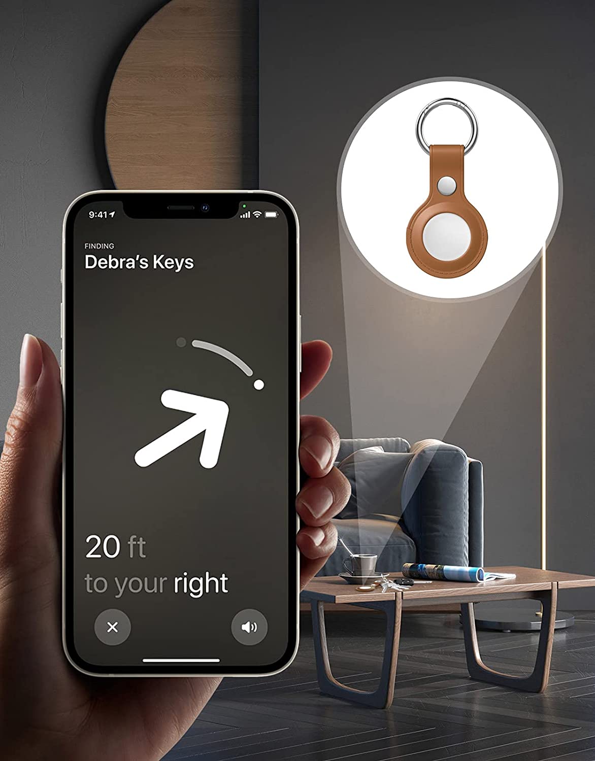Close-up of a phone showing a location screen with an arrow, keys in a leather holder, and a couch.