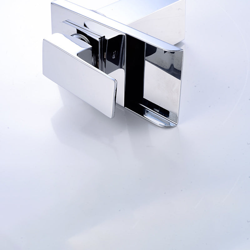 Sleek chrome door handle on white background, with reflective surfaces and modern design.