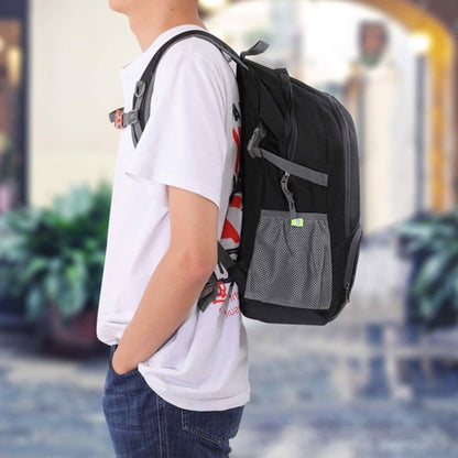Person in a white t-shirt and jeans wearing a black backpack with mesh side pocket, blurred background.