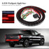 LED tailgate light bar with wires and plug; light on black truck&