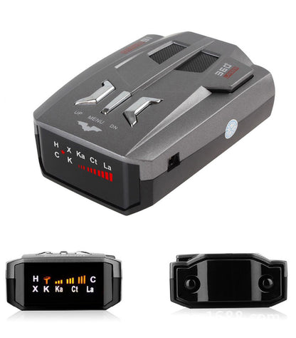 Gray radar detector with angular design, LED display, and red indicator lights.