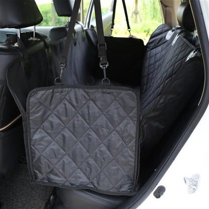 Black quilted pet seat cover hanging inside a car&