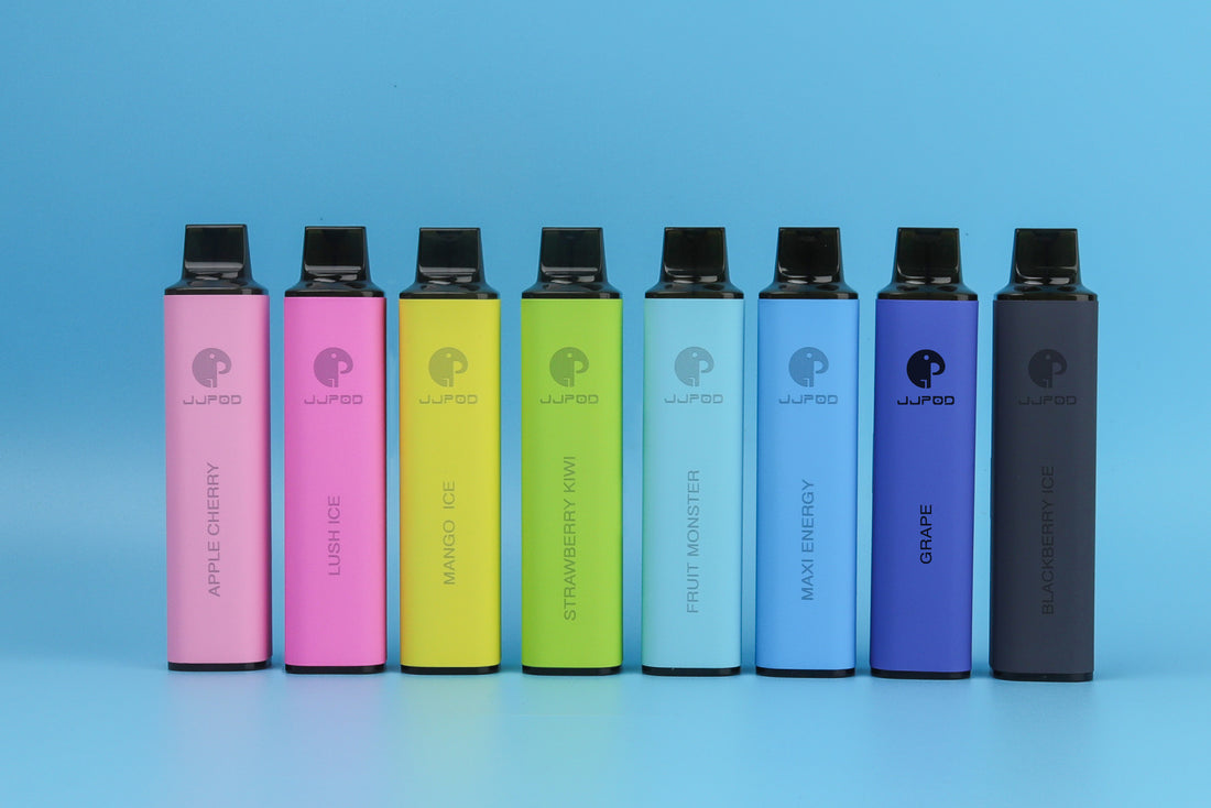 Eight colorful vape pens in pastel hues against a light blue background.