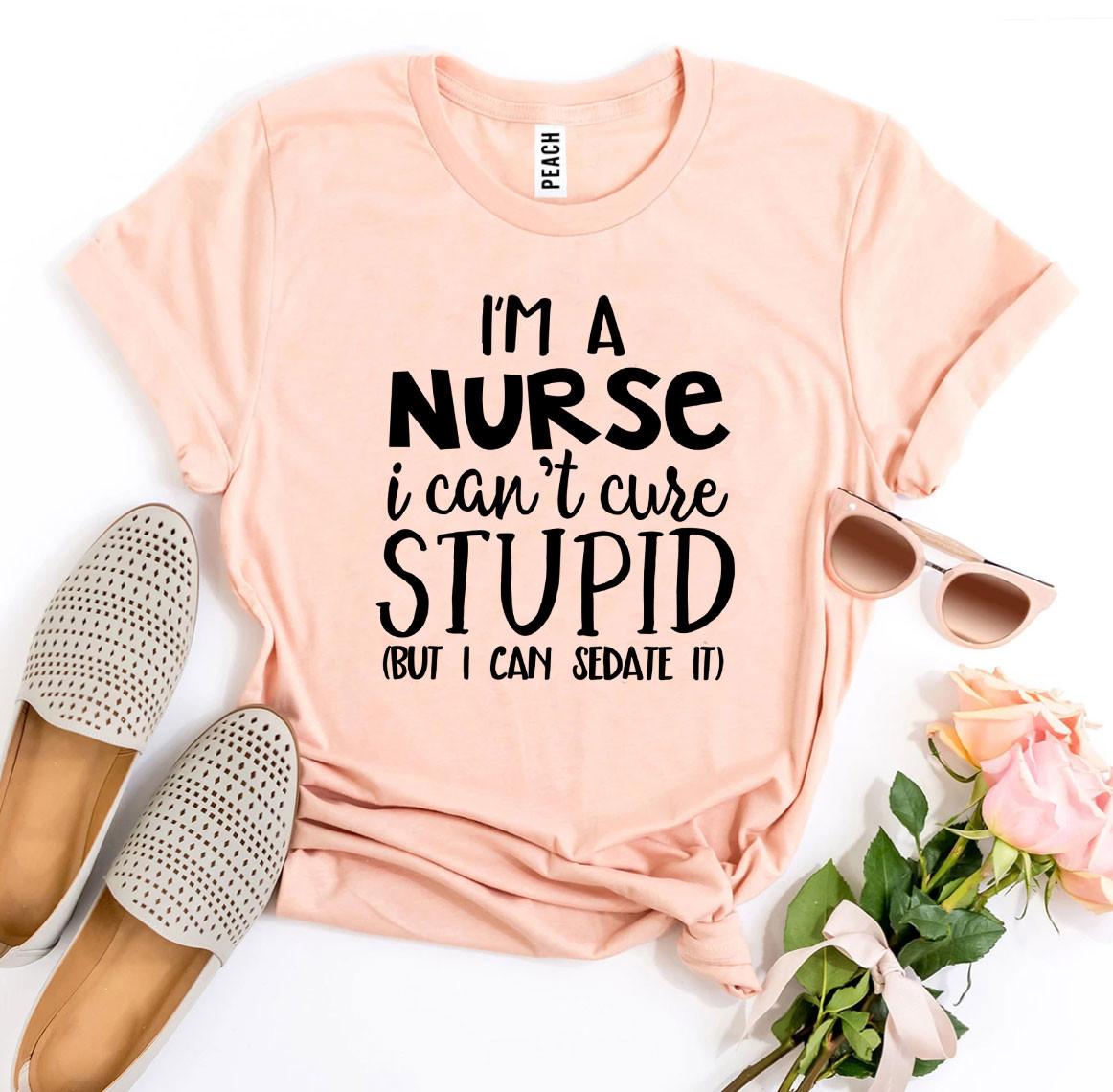 Peach t-shirt with black text, beige loafers, pink sunglasses, and roses on a white background.