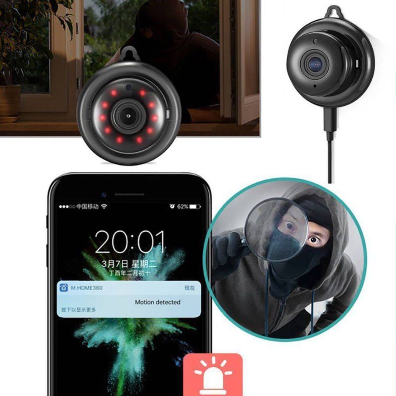 Security camera with red lights, smartphone displaying "Motion detected," and magnified intruder image.