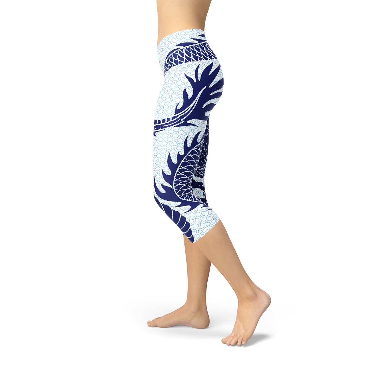 Person wearing blue and white dragon-patterned leggings, standing on tiptoes, side view.