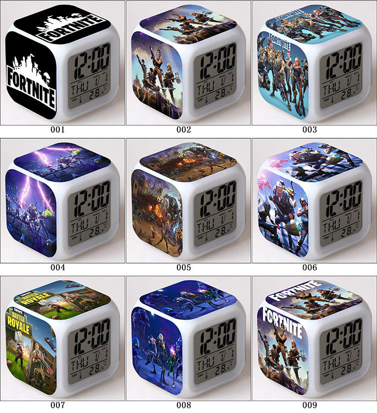 Cube-shaped digital clocks with Fortnite designs, vibrant images on each side, and digital displays.