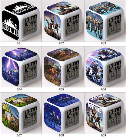 Cube-shaped digital clocks with Fortnite designs, vibrant images on each side, and digital displays.