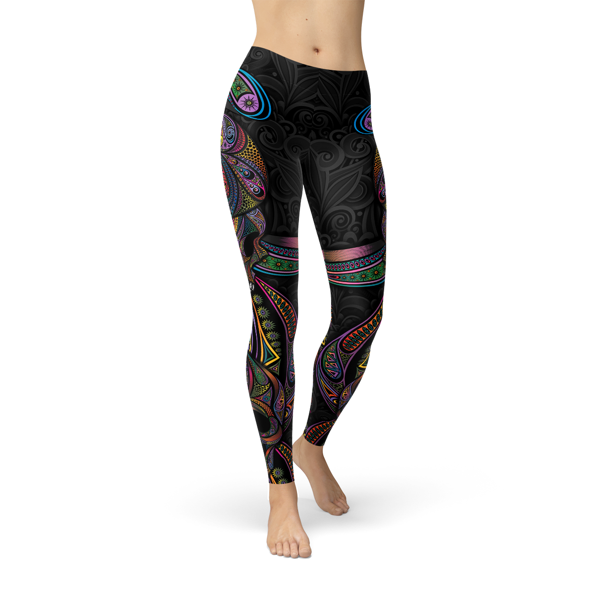 Colorful paisley leggings on woman, featuring intricate multicolored patterns on a black background.