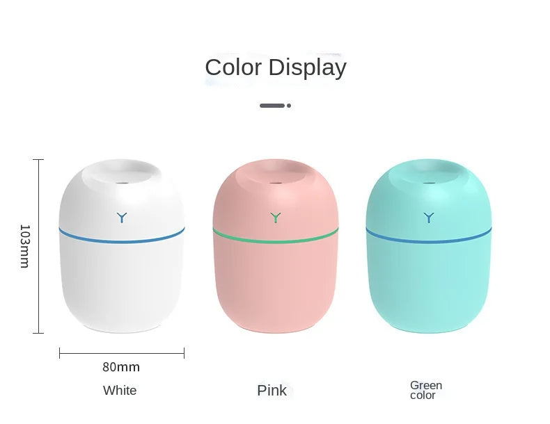 Three egg-shaped humidifiers in white, pink, and green with blue and green bands, 103mm tall.