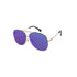 Aviator sunglasses with gold frames and blue tinted lenses on a white background.