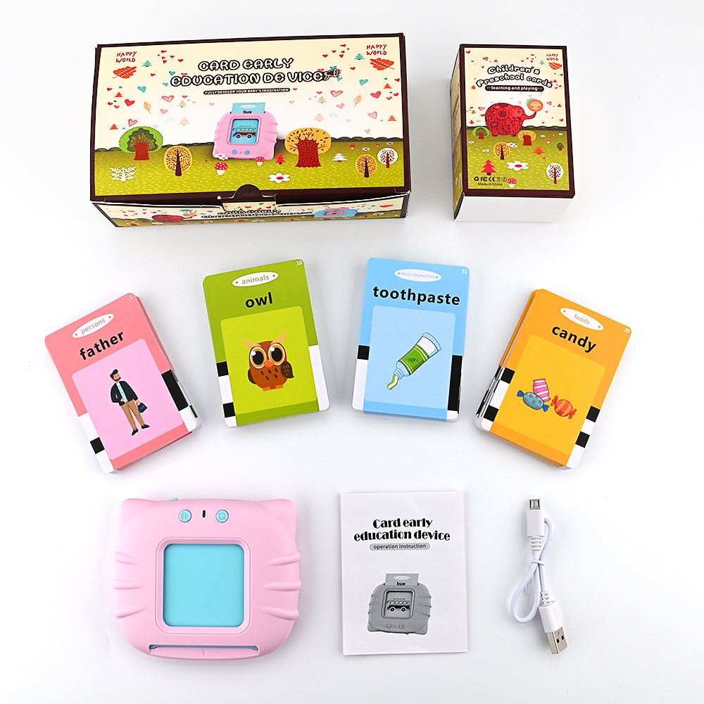 Pink device with cards labeled father, owl, toothpaste, and candy. Includes box and USB cable.