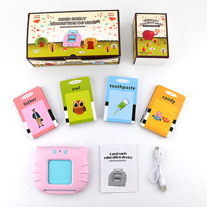 Pink device with cards labeled father, owl, toothpaste, and candy. Includes box and USB cable.