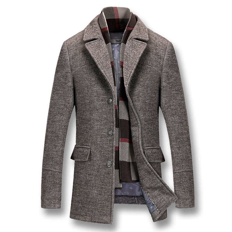 Gray wool coat with lapels, three buttons, front pockets, and a striped scarf inside.