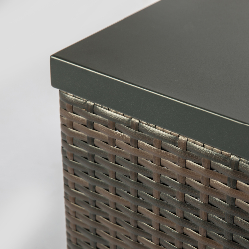 Close-up of a brown wicker box with a smooth dark gray top.