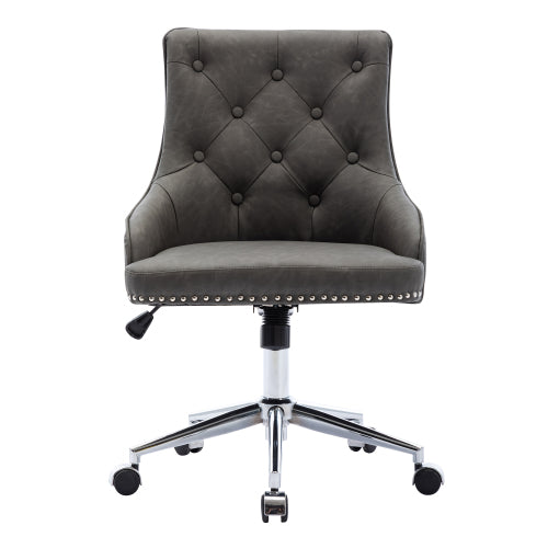 Gray, tufted office chair with button details, chrome base, and casters.