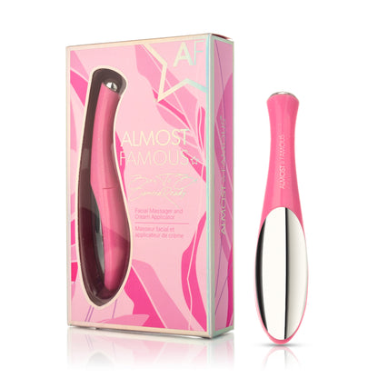 Pink facial massager and cream applicator in a vibrant pink box with floral design and text.