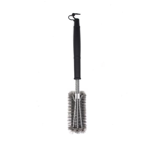 Black-handled grill brush with metal bristles and hanging loop on white background.