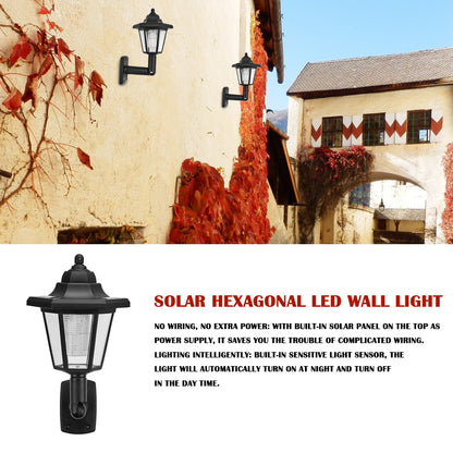 Black hexagonal wall lights on a beige wall, surrounded by red ivy, with text about solar LED features.