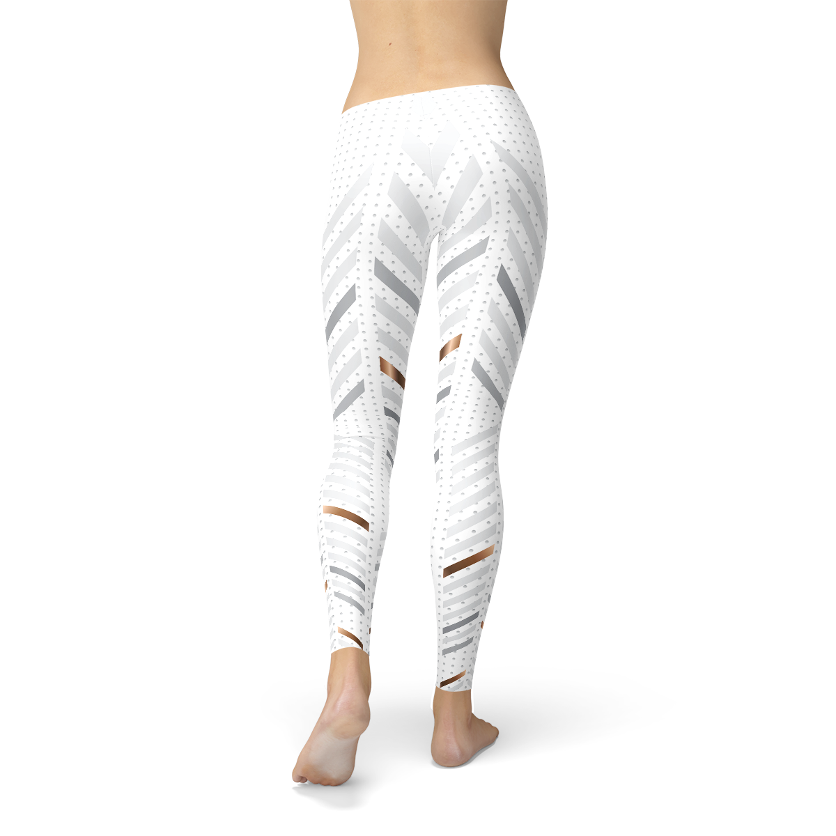 Back view of white leggings with grey diagonal stripes and small dots, worn by a barefoot person.