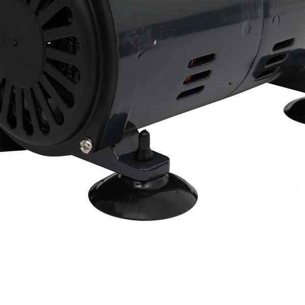 Black motor with vent holes and round suction cup feet on a white background.