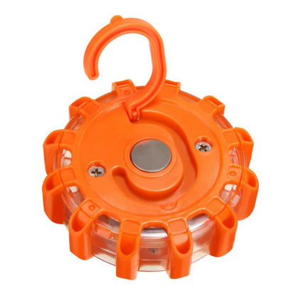 Orange circular safety light with a hook and a central magnet.