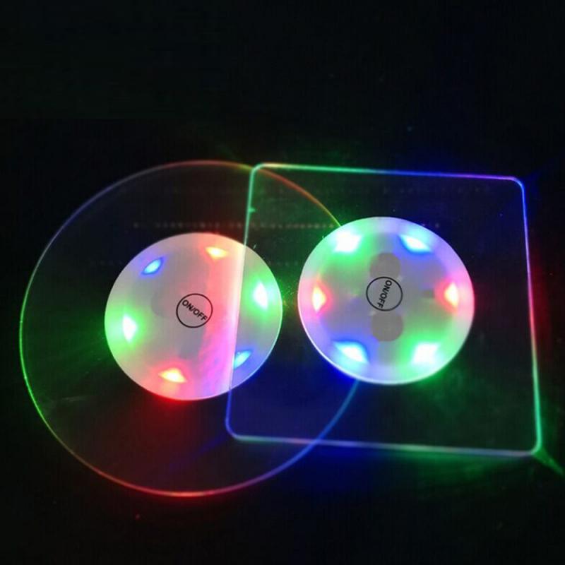 Glowing discs with multicolored lights on a dark background, one circular and one rectangular.