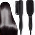Black electric hairbrush with bristles, next to shiny, straight, black hair on a white background.