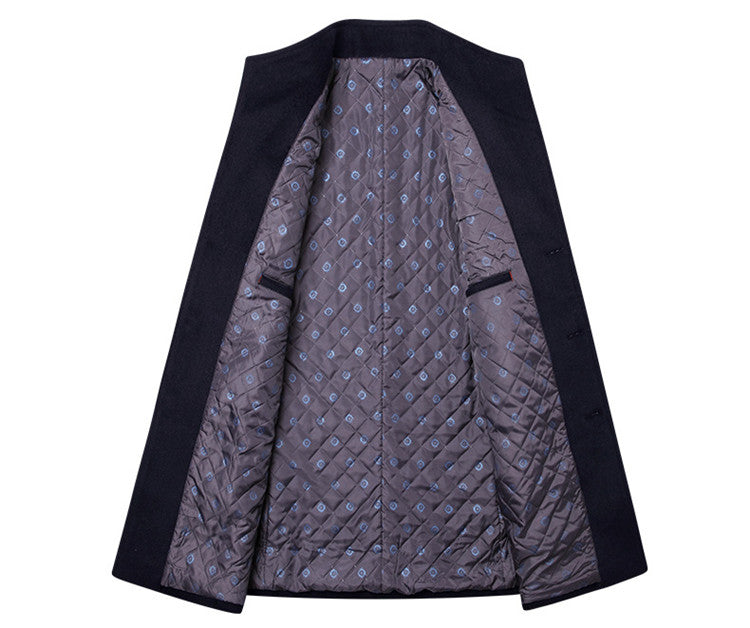 Open dark coat showing quilted gray lining with blue square pattern and inner pockets.