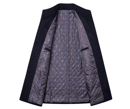 Open dark coat showing quilted gray lining with blue square pattern and inner pockets.
