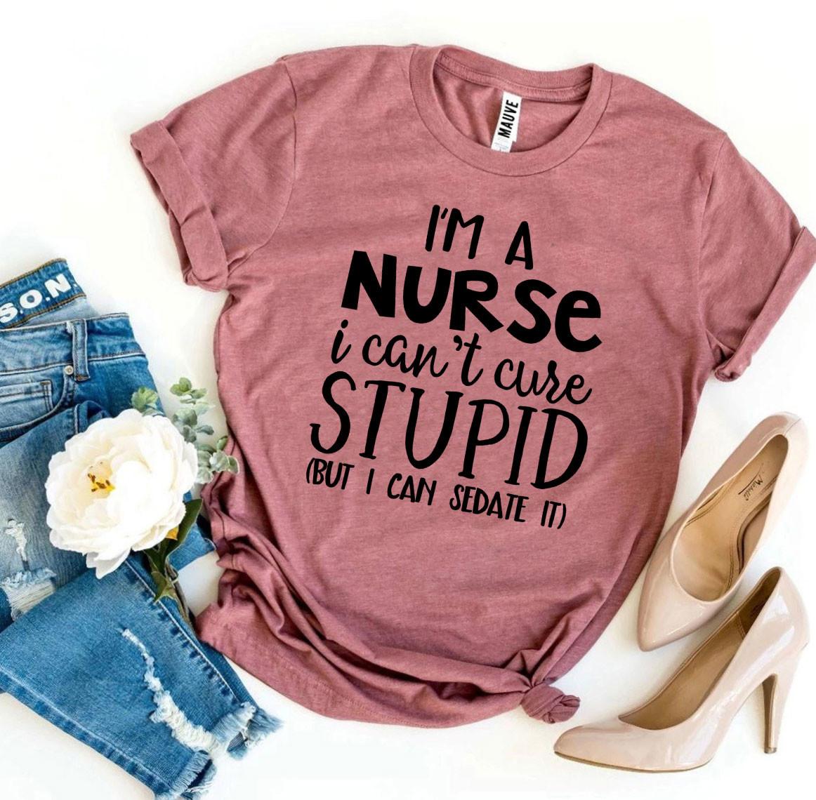 Pink T-shirt with humorous text, paired with ripped jeans and beige high heels.