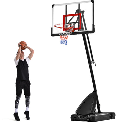 Man aiming basketball at a freestanding black hoop with a clear backboard and red and blue net.