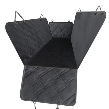 Black quilted car seat cover with a hammock design and adjustable straps.