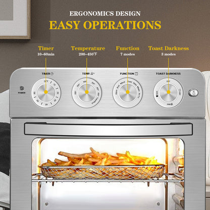 Silver toaster oven with fries inside, four control dials for timer, temperature, function, and toast darkness.