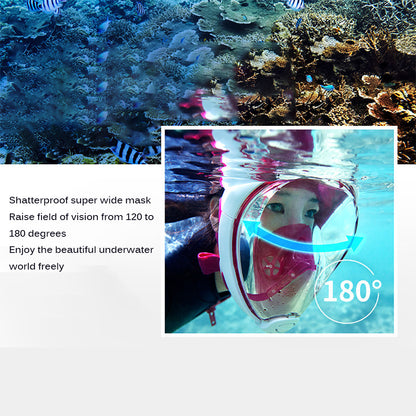 Person snorkeling with a wide pink and white mask, surrounded by vibrant coral and striped fish.