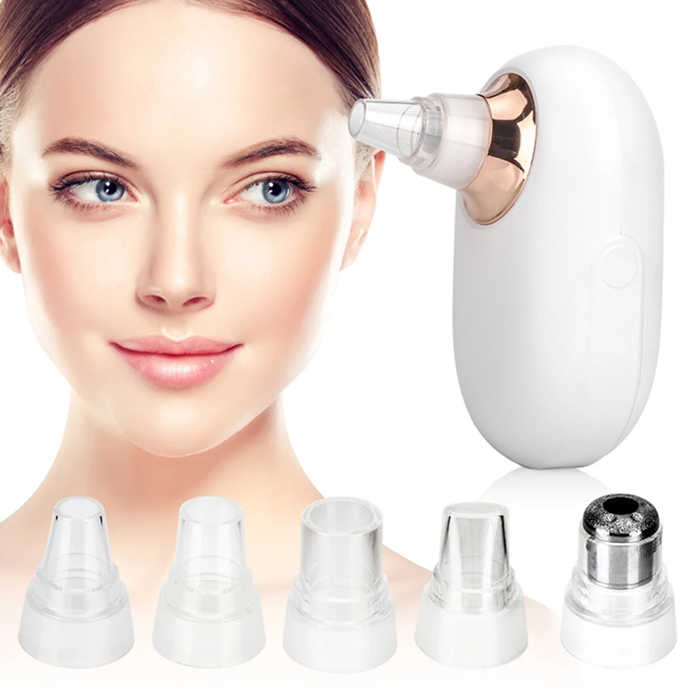 Woman with a facial device. Device is white with gold accents; five clear nozzles shown.