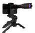 Smartphone with black 32x zoom lens on a compact tripod, featuring a purple lens reflection.