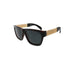 Tortoiseshell sunglasses with black lenses and gold-striped temples.